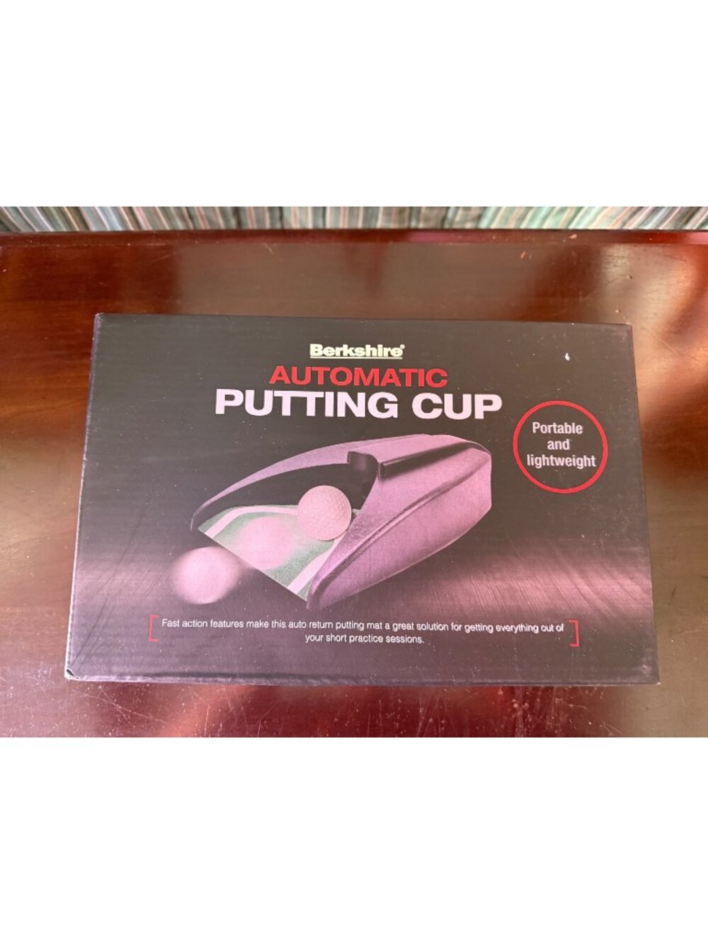 Berkshire Automatic Putting Cup, a golf training aid.